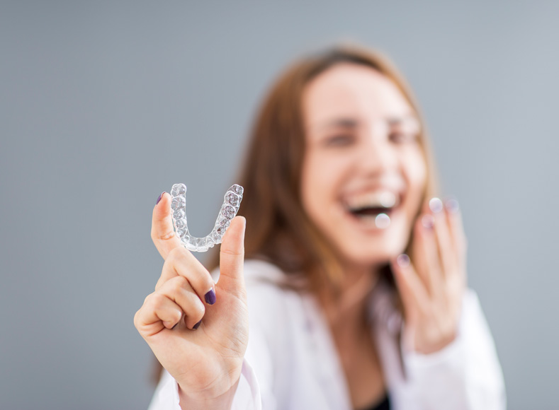 Orthodontic retainers: fixed and removable options