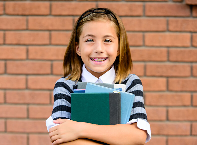 School-Year Orthodontics: A Parent's Guide to Braces and Clear Aligners at School School-Year Orthodontics: A Parent's Guide to Braces and Clear Aligners at School